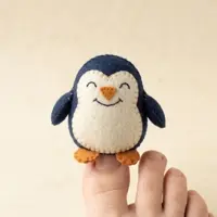 Toe puppet being worn on a toe