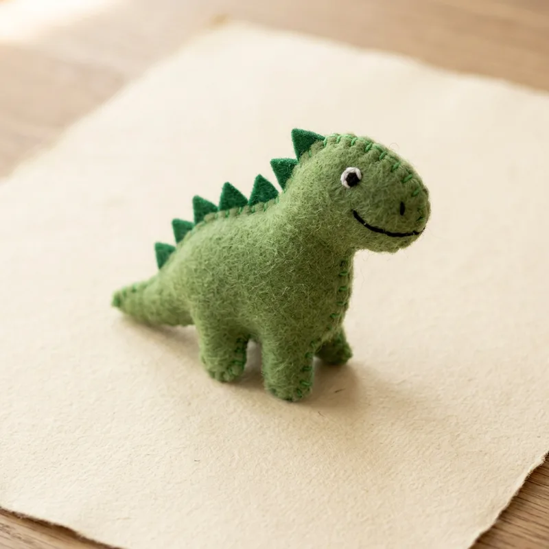 Dizzy Dino toe puppet front view