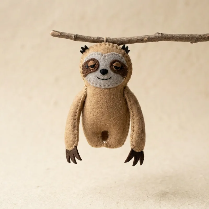 Sleepy Sloth toe puppet on a toe